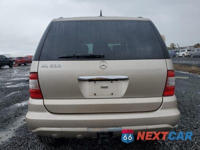 Zdjęcie 6 z 14 samochodu: 2005 MERCEDES-BENZ ML 500 VIN:4JGAB75E95A539368 - miniatura