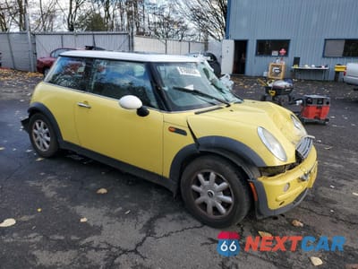 Czwarte zdjęcie samochodu z boku: 2004 MINI COOPER VIN:WMWRC334X4TJ61472 - miniatura