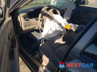 Zdjęcie 8 z 13 samochodu: 2003 BUICK CENTURY CUSTOM VIN:2G4WS52J931297765 - miniatura