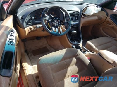 Zdjęcie 8 z 12 samochodu: 1998 FORD MUSTANG VIN:1FAFP4046WF160122 - miniatura