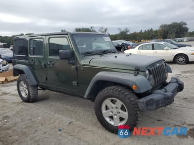 Czwarte zdjęcie samochodu z boku: 2008 JEEP WRANGLER UNLIMITED RUBICON VIN:1J4GA69168L601217 - miniatura