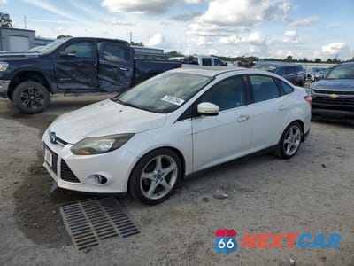 2013 FORD FOCUS TITANIUM 1FADP3J25DL259382 - główne zdjęcie licytacji z USA - miniatura