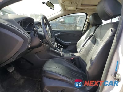 Zdjęcie 7 z 13 samochodu: 2013 FORD FOCUS TITANIUM VIN:1FADP3J25DL259382 - miniatura