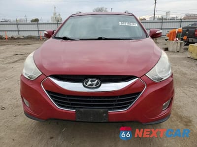 Piąte zdjęcie samochodu w środku: 2011 HYUNDAI TUCSON GLS VIN:KM8JU3AC6BU209866 - miniatura
