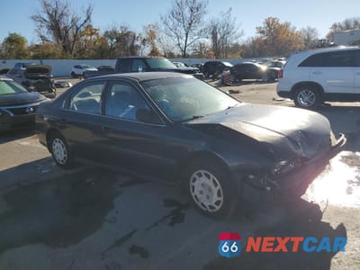 Czwarte zdjęcie samochodu z boku: 1994 HONDA ACCORD LX VIN:1HGCD5638RA000515 - miniatura