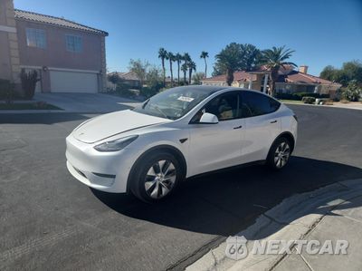 Trzecie zdjęcie samochodu z tyłu: 2023 TESLA MODEL Y VIN:7SAYGDEEXPA033027 - miniatura