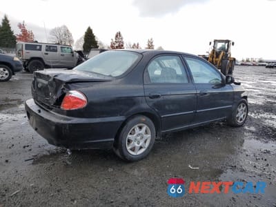 Trzecie zdjęcie samochodu z tyłu: 2002 KIA SPECTRA BASE VIN:KNAFB121225171948 - miniatura