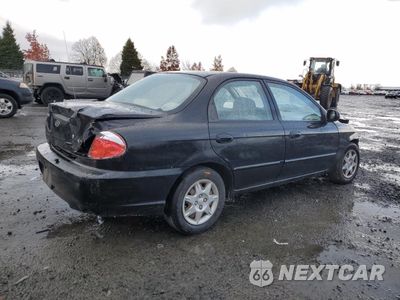 Trzecie zdjęcie samochodu z tyłu: 2002 KIA SPECTRA BASE VIN:KNAFB121225171948 - miniatura