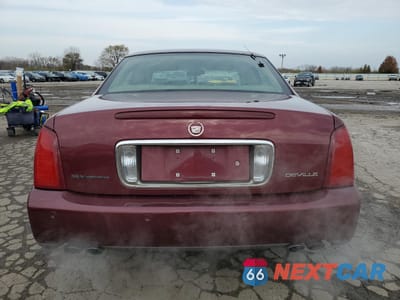 Zdjęcie 6 z 14 samochodu: 2002 CADILLAC DEVILLE VIN:1G6KD57Y72U259850 - miniatura