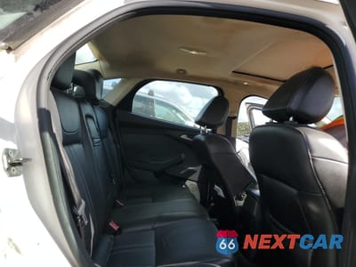 Zdjęcie 10 z 13 samochodu: 2013 FORD FOCUS TITANIUM VIN:1FADP3J25DL259382 - miniatura