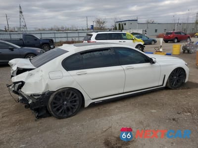 Trzecie zdjęcie samochodu z tyłu: 2021 BMW 750 XI VIN:WBA7U2C09MCF59416 - miniatura