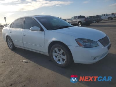 Czwarte zdjęcie samochodu z boku: 2003 NISSAN ALTIMA BASE VIN:1N4AL11D93C276964 - miniatura