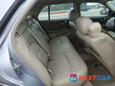 Zdjęcie 10 z 12 samochodu: 2004 CADILLAC DEVILLE VIN:1G6KD54Y04U242119 - miniatura