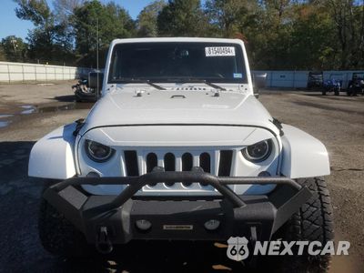 Piąte zdjęcie samochodu w środku: 2016 JEEP WRANGLER UNLIMITED SAHARA VIN:1C4BJWEG1GL173369 - miniatura