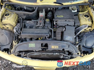 Zdjęcie 12 z 14 samochodu: 2004 MINI COOPER VIN:WMWRC334X4TJ61472 - miniatura