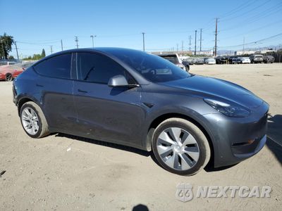 Czwarte zdjęcie samochodu z boku: 2023 TESLA MODEL Y VIN:7SAYGDED0PF960614 - miniatura