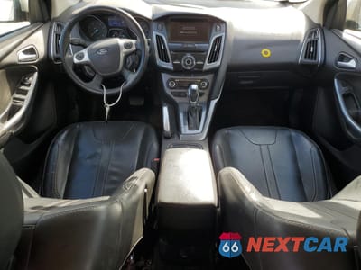 Zdjęcie 8 z 13 samochodu: 2013 FORD FOCUS TITANIUM VIN:1FADP3J25DL259382 - miniatura