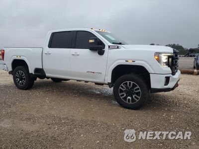 Czwarte zdjęcie samochodu z boku: 2021 GMC SIERRA K2500 AT4 VIN:1GT49PEYXMF198099 - miniatura
