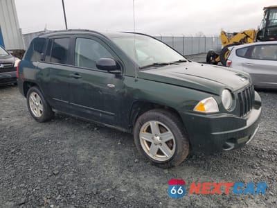 Czwarte zdjęcie samochodu z boku: 2010 JEEP COMPASS SPORT VIN:1J4NT4FA2AD654961 - miniatura