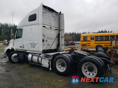 Trzecie zdjęcie samochodu z tyłu: 2012 VOLVO VN VNL VIN:4V4NC9EG5CN543069 - miniatura