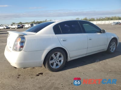 Trzecie zdjęcie samochodu z tyłu: 2003 NISSAN ALTIMA BASE VIN:1N4AL11D93C276964 - miniatura
