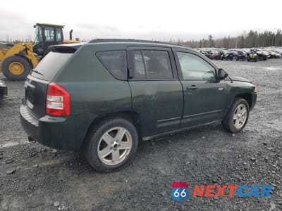 Trzecie zdjęcie samochodu z tyłu: 2010 JEEP COMPASS SPORT VIN:1J4NT4FA2AD654961 - miniatura