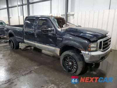Czwarte zdjęcie samochodu z boku: 2000 FORD F350 SRW SUPER DUTY VIN:1FTSW31F8YEE19157 - miniatura