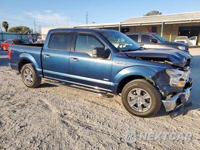Czwarte zdjęcie samochodu z boku: 2015 FORD F150 SUPERCREW VIN:1FTEW1CP1FKD96181 - miniatura