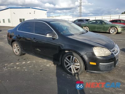 Czwarte zdjęcie samochodu z boku: 2005 VOLKSWAGEN NEW JETTA 2.5L OPTION PACKAGE 1 VIN:3VWSF71K45M601929 - miniatura