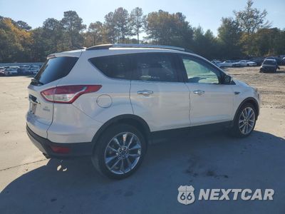 Trzecie zdjęcie samochodu z tyłu: 2014 FORD ESCAPE SE VIN:1FMCU0GX6EUE06512 - miniatura