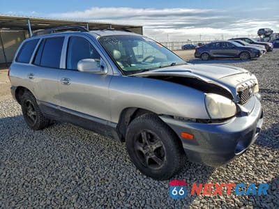 Czwarte zdjęcie samochodu z boku: 2003 HYUNDAI SANTA FE GLS VIN:KM8SC73E23U464917 - miniatura