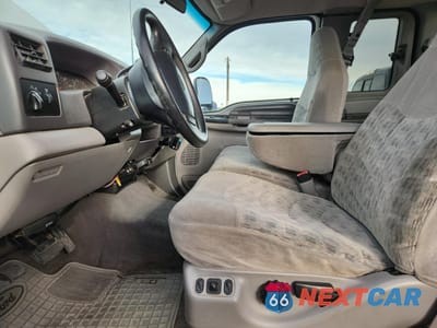 Zdjęcie 7 z 12 samochodu: 1999 FORD F250 SUPER DUTY VIN:1FTNX21S3XEE33516 - miniatura