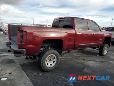 Trzecie zdjęcie samochodu z tyłu: 2017 CHEVROLET SILVERADO K1500 HIGH COUNTRY VIN:3GCUKTEJ0HG422856 - miniatura