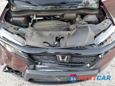 Zdjęcie 12 z 12 samochodu: 2021 HONDA PASSPORT EXL VIN:5FNYF8H59MB006564 - miniatura