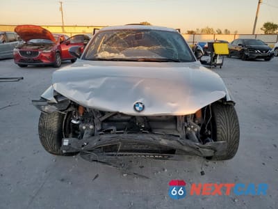 Piąte zdjęcie samochodu w środku: 2012 BMW 128 I VIN:WBAUP7C58CVP22639 - miniatura