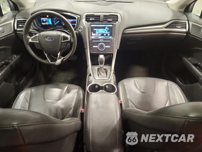 Zdjęcie 8 z 14 samochodu: 2016 FORD FUSION TITANIUM VIN:3FA6P0K91GR319425 - miniatura
