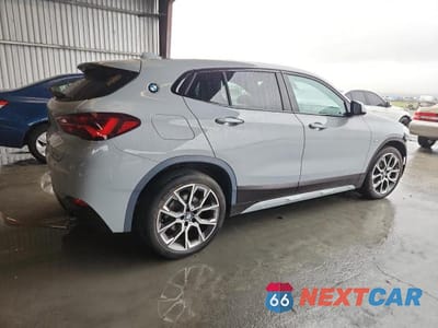 Trzecie zdjęcie samochodu z tyłu: 2022 BMW X2 XDRIVE28I VIN:WBXYJ1C04N5T66283 - miniatura