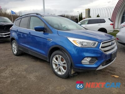 Czwarte zdjęcie samochodu z boku: 2018 FORD ESCAPE SEL VIN:1FMCU9HD7JUC43453 - miniatura
