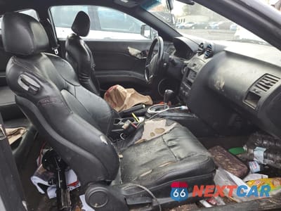 Zdjęcie 7 z 13 samochodu: 2003 HYUNDAI TIBURON VIN:KMHHN65F13U077098 - miniatura