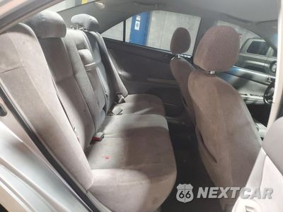Zdjęcie 10 z 12 samochodu: 2002 TOYOTA CAMRY LE VIN:4T1BE32K32U596822 - miniatura