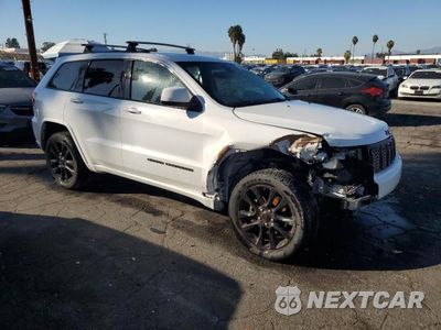 Czwarte zdjęcie samochodu z boku: 2018 JEEP GRAND CHEROKEE LAREDO VIN:1C4RJEAG7JC181689 - miniatura