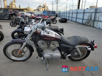 Trzecie zdjęcie samochodu z tyłu: 2005 HARLEY-DAVIDSON XL883 C VIN:1HD4CJM315K444985 - miniatura