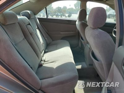 Zdjęcie 10 z 12 samochodu: 2004 TOYOTA CAMRY LE VIN:JTDBE32K040266814 - miniatura