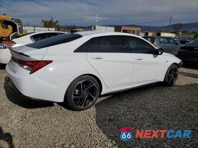 Trzecie zdjęcie samochodu z tyłu: 2023 HYUNDAI ELANTRA N LINE VIN:KMHLR4AF4PU430562 - miniatura