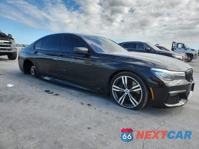 Czwarte zdjęcie samochodu z boku: 2017 BMW 740 XE VIN:WBA7J2C39HG497790 - miniatura