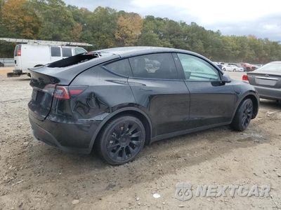 Trzecie zdjęcie samochodu z tyłu: 2023 TESLA MODEL Y VIN:7SAYGDEE8PA026285 - miniatura