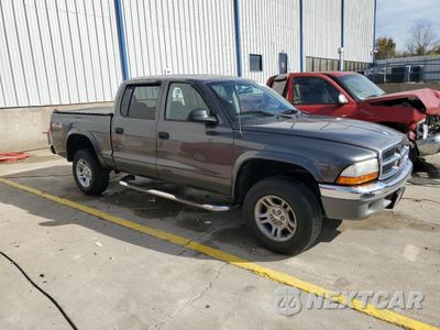 Czwarte zdjęcie samochodu z boku: 2004 DODGE DAKOTA QUAD SLT VIN:1D7HG48N54S627234 - miniatura