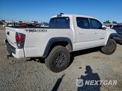 Trzecie zdjęcie samochodu z tyłu: 2021 TOYOTA TACOMA DOUBLE CAB VIN:3TMCZ5AN6MM402862 - miniatura