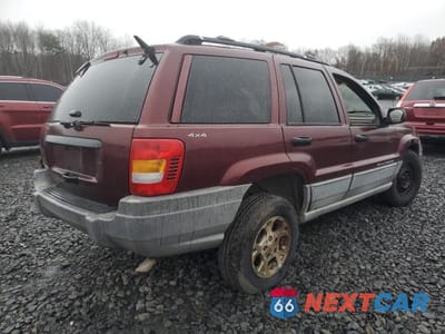 Trzecie zdjęcie samochodu z tyłu: 1999 JEEP GRAND CHEROKEE LAREDO VIN:1J4GW58SXXC566847 - miniatura
