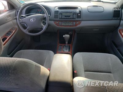 Zdjęcie 8 z 12 samochodu: 2003 TOYOTA CAMRY LE VIN:4T1BE30K13U751999 - miniatura